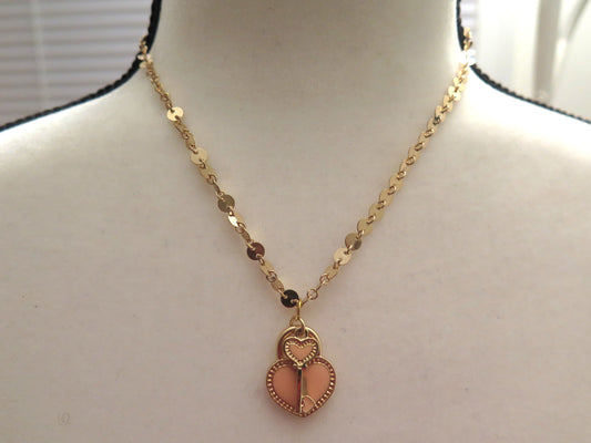 gold necklace with keyheart pendant