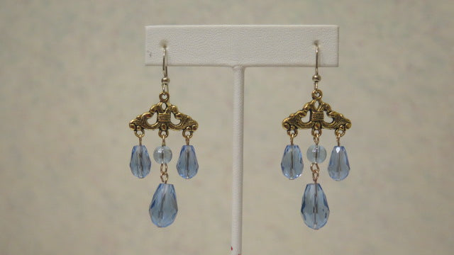 sky blue chandelier earrings with Victorian-inspired design, featuring gold-tone connectors and caps