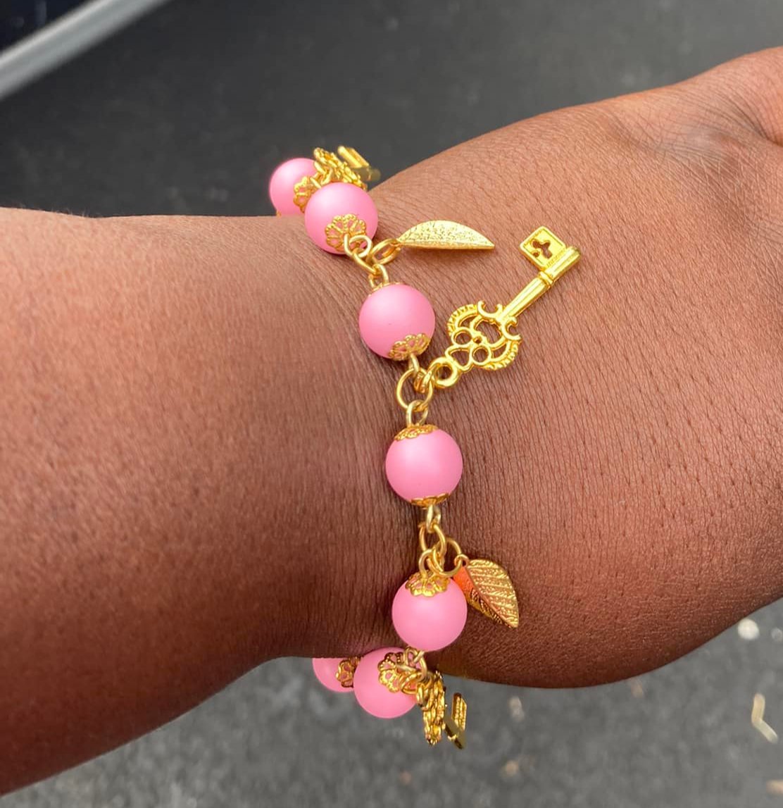 Pink Charm Bracelet on hand