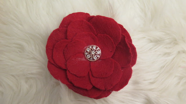 red brooch