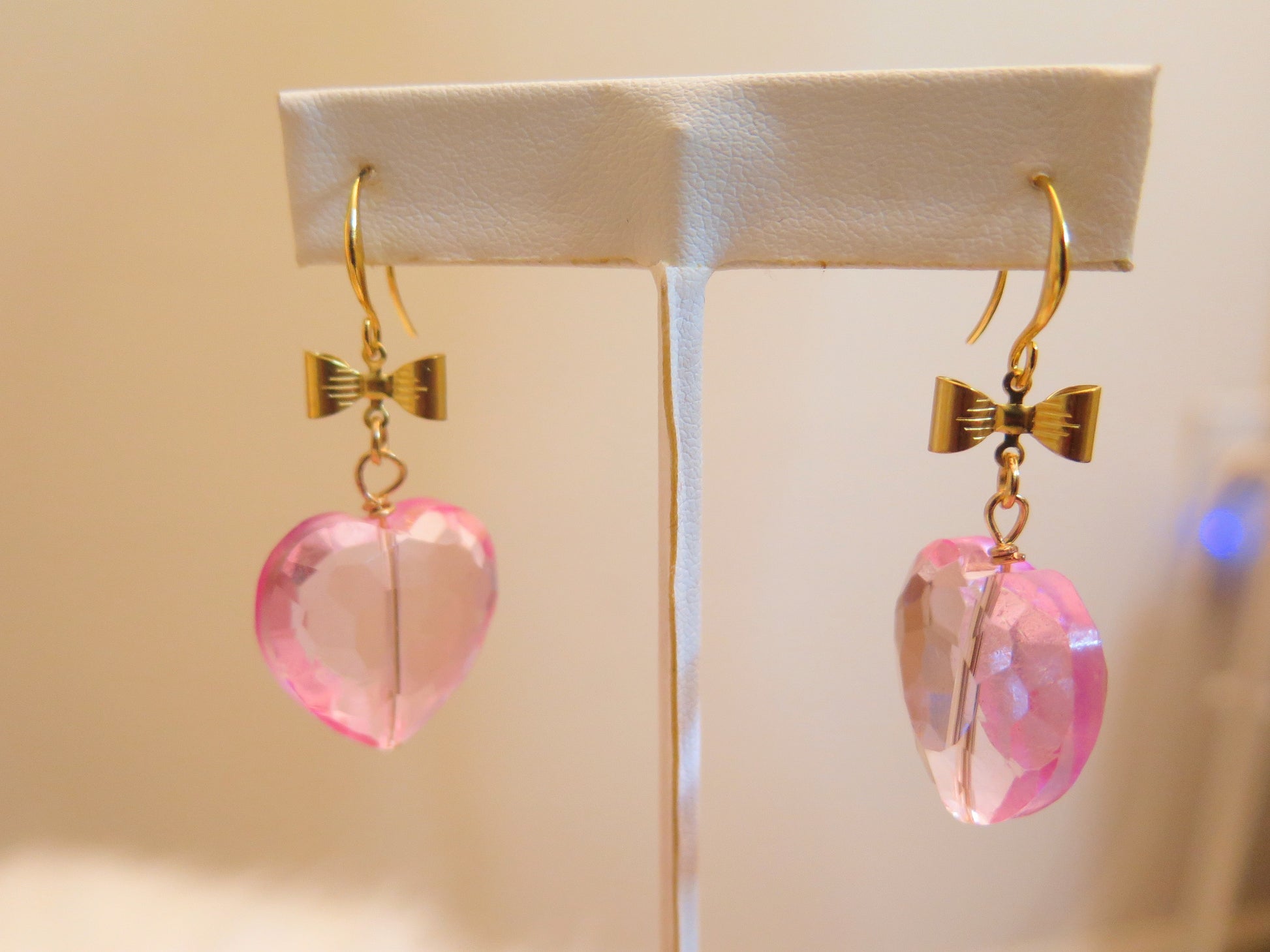 pink heart-shape earrings