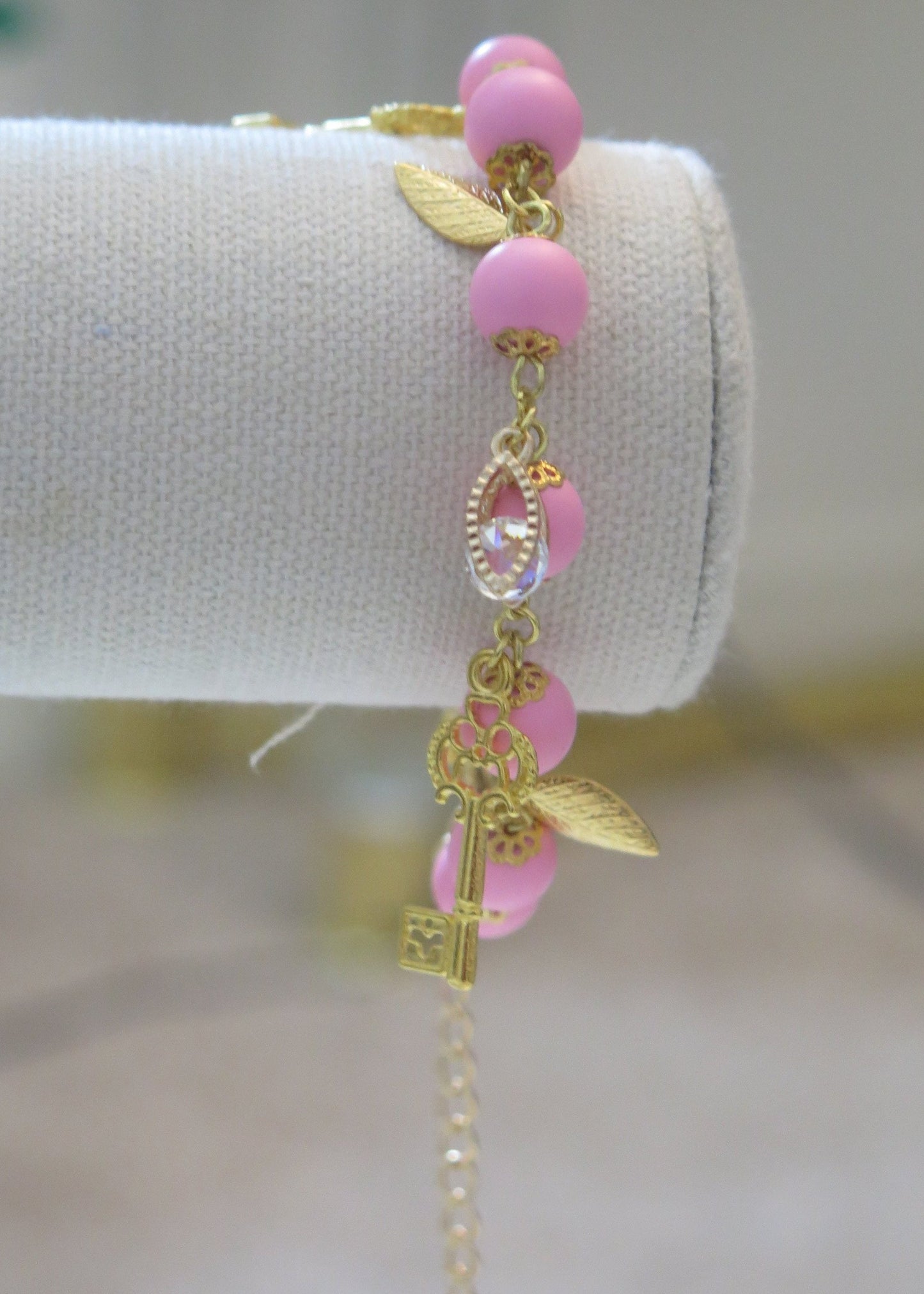 pink charm bracelet