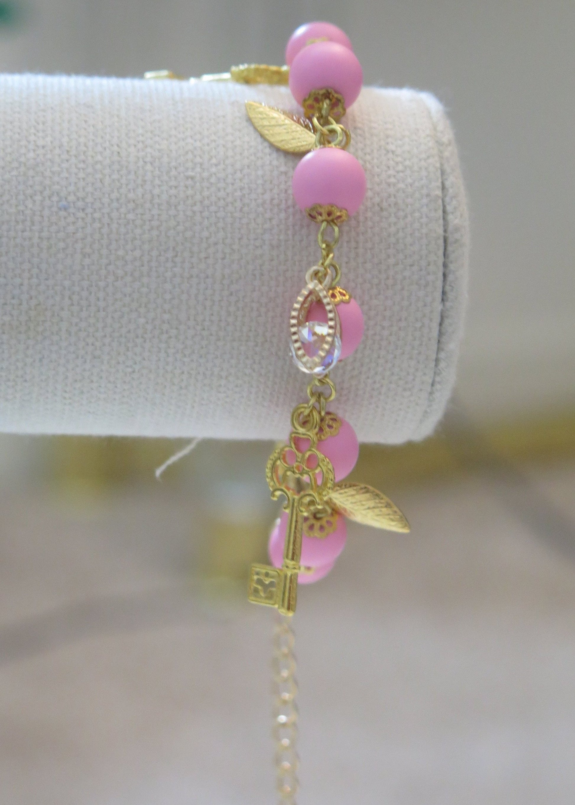 pink charm bracelet