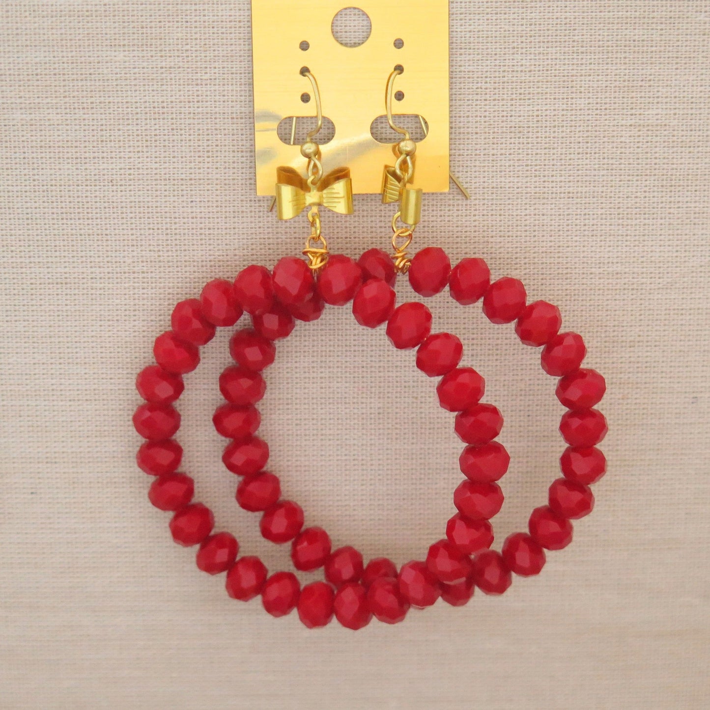 red bow hoop earring