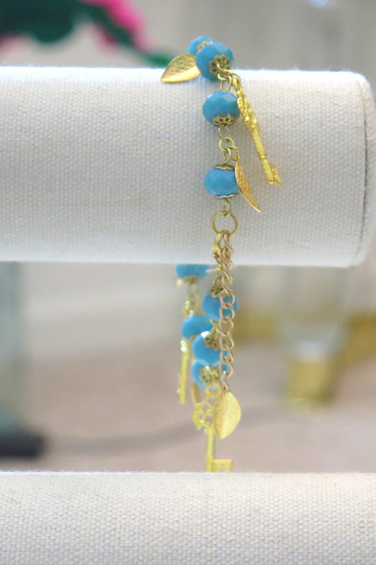 blue turquoise beads bracelet with leaf charm