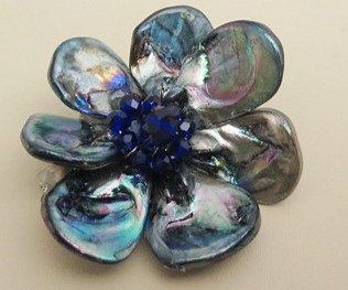 Blue flower brooch pin close up detail