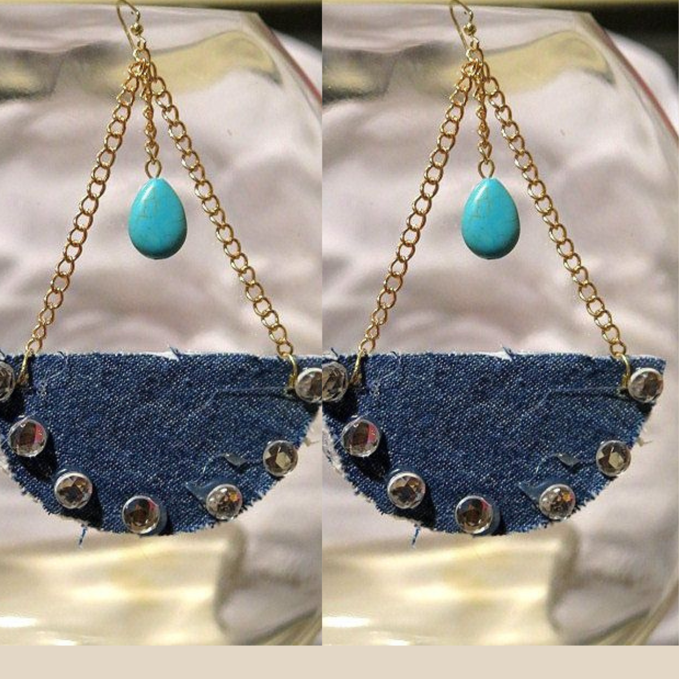 A pair of denim earrings designed in the shape of a boat with pearl accents.