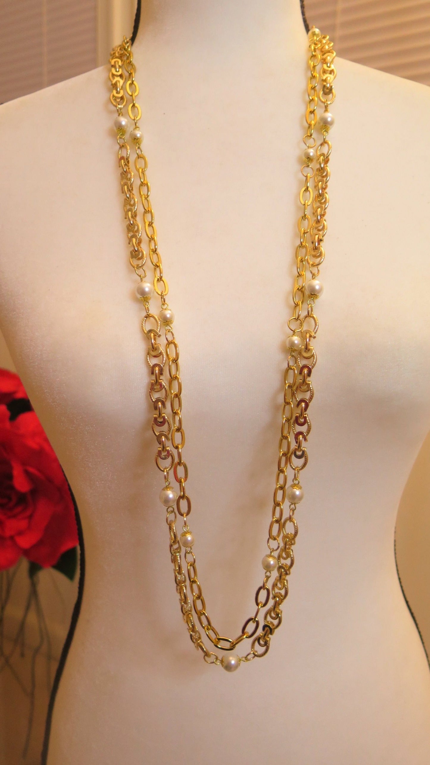 Double long gold necklace with pearl