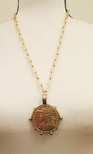 Gold medalion necklace