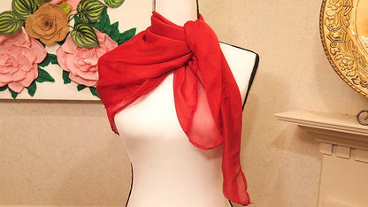 Red scarf worn and styled for women