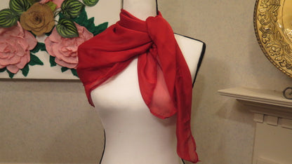 Red scarf worn and styled for women