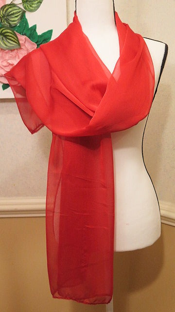 Large red scarf styled for women