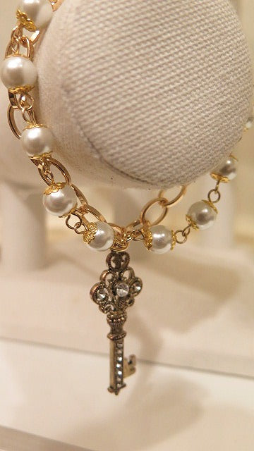 Double Pearl Gold Bracelet  With Key Charm