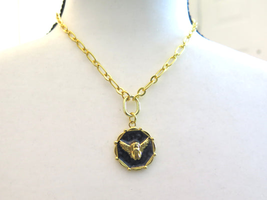 Gold Necklace With Black Pendant