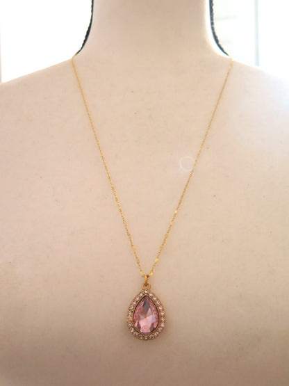 long gold necklace with pink pendant for women