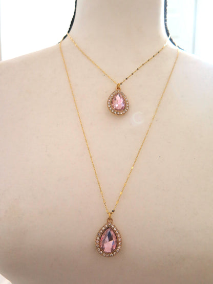 Long gold necklace with pink pendant for women