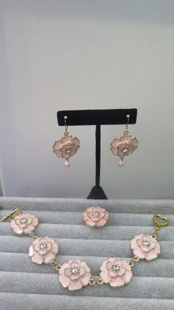 pink flower earring, bracelet and ring