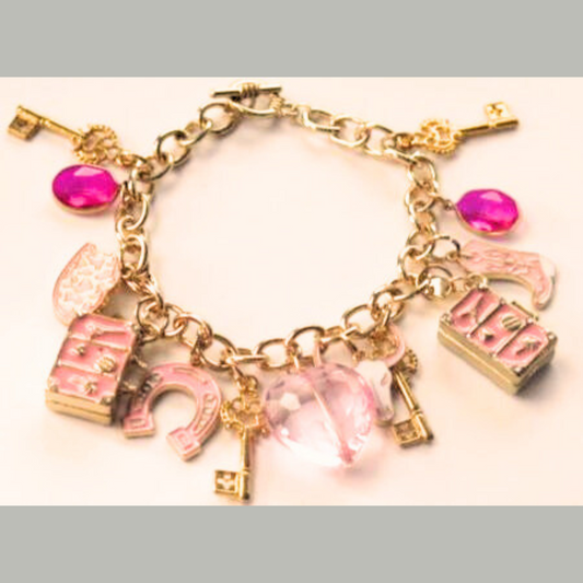 A gold-tone metal bracelet featuring pink charms with a toggle closure.