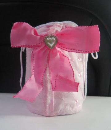 Pink round bow cosmetic storage and travel bag for women