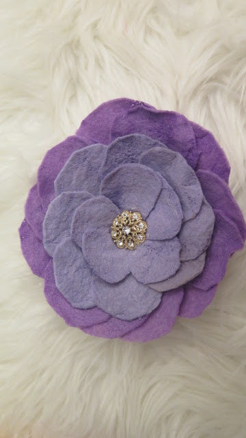 Purple felt flower brooch close up detail