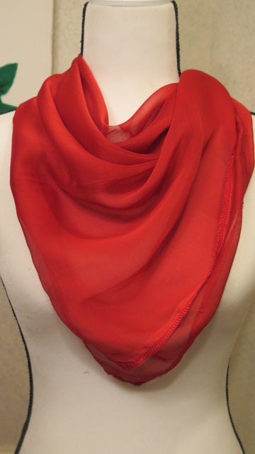 Red scarf worn and styled for women