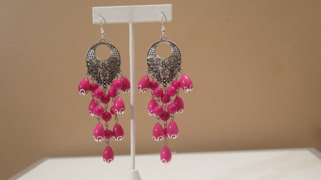 Fuchsia silver chandelier earring close up detail