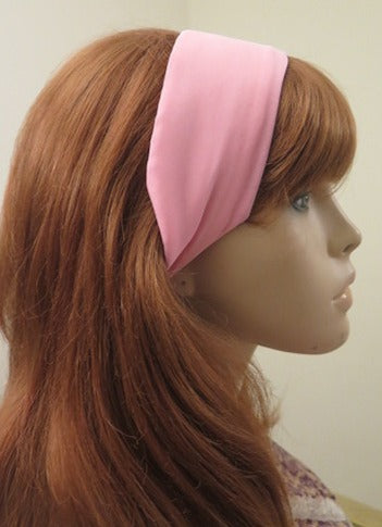 Pink chiffon headband worn by women