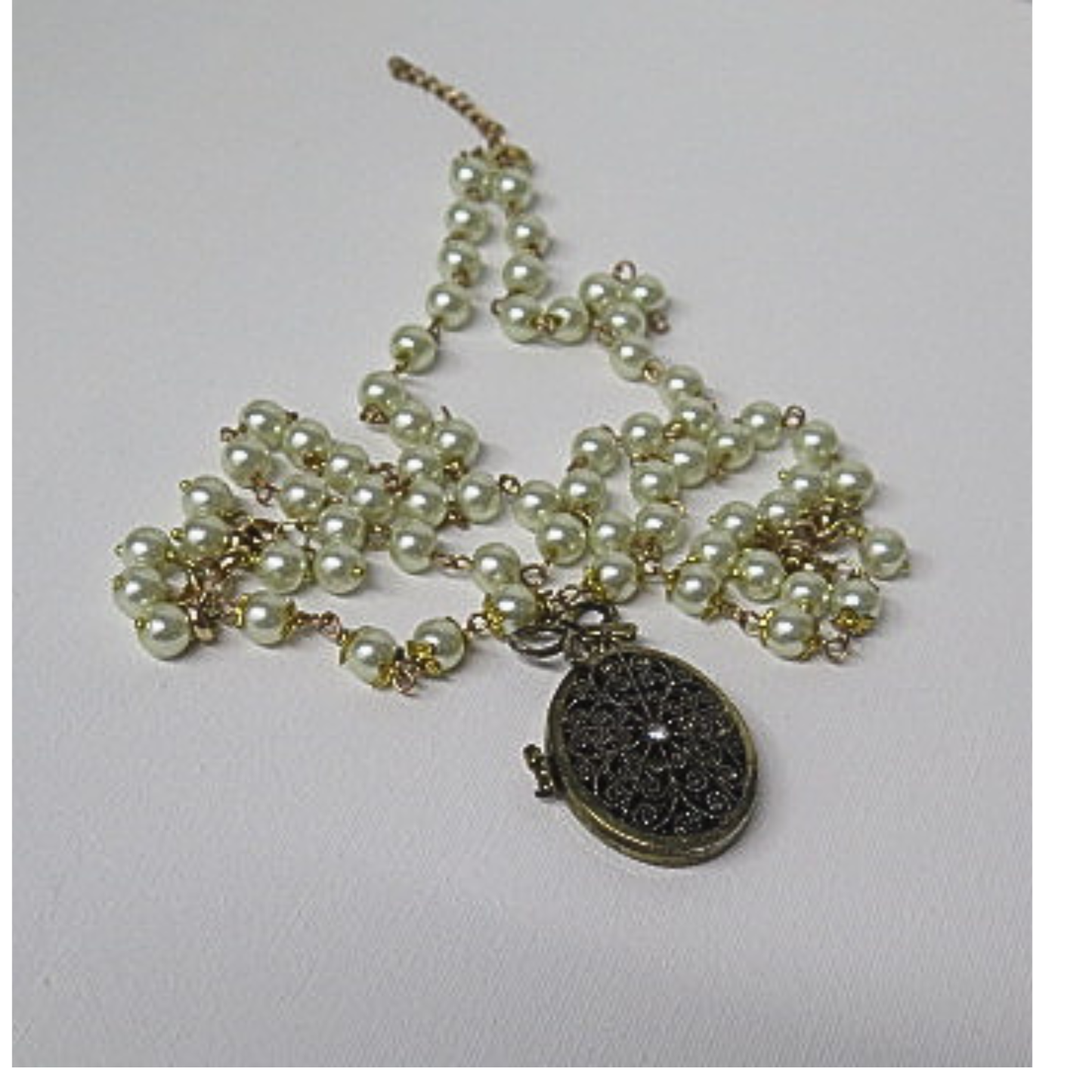 Vintage Style Pearl Necklace with Antique Bronze Filigree Locket | Long Pearl Chain with Bow Charm Oval Photo Locket | 33 Inch Romantic Heirloom Necklace for Women