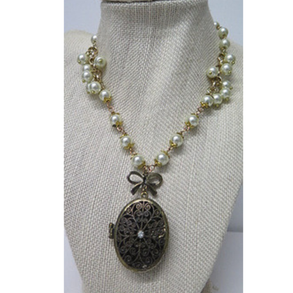 Vintage Style Pearl Necklace with Antique Bronze Filigree Locket | Long Pearl Chain with Bow Charm Oval Photo Locket | 33 Inch Romantic Heirloom Necklace for Women