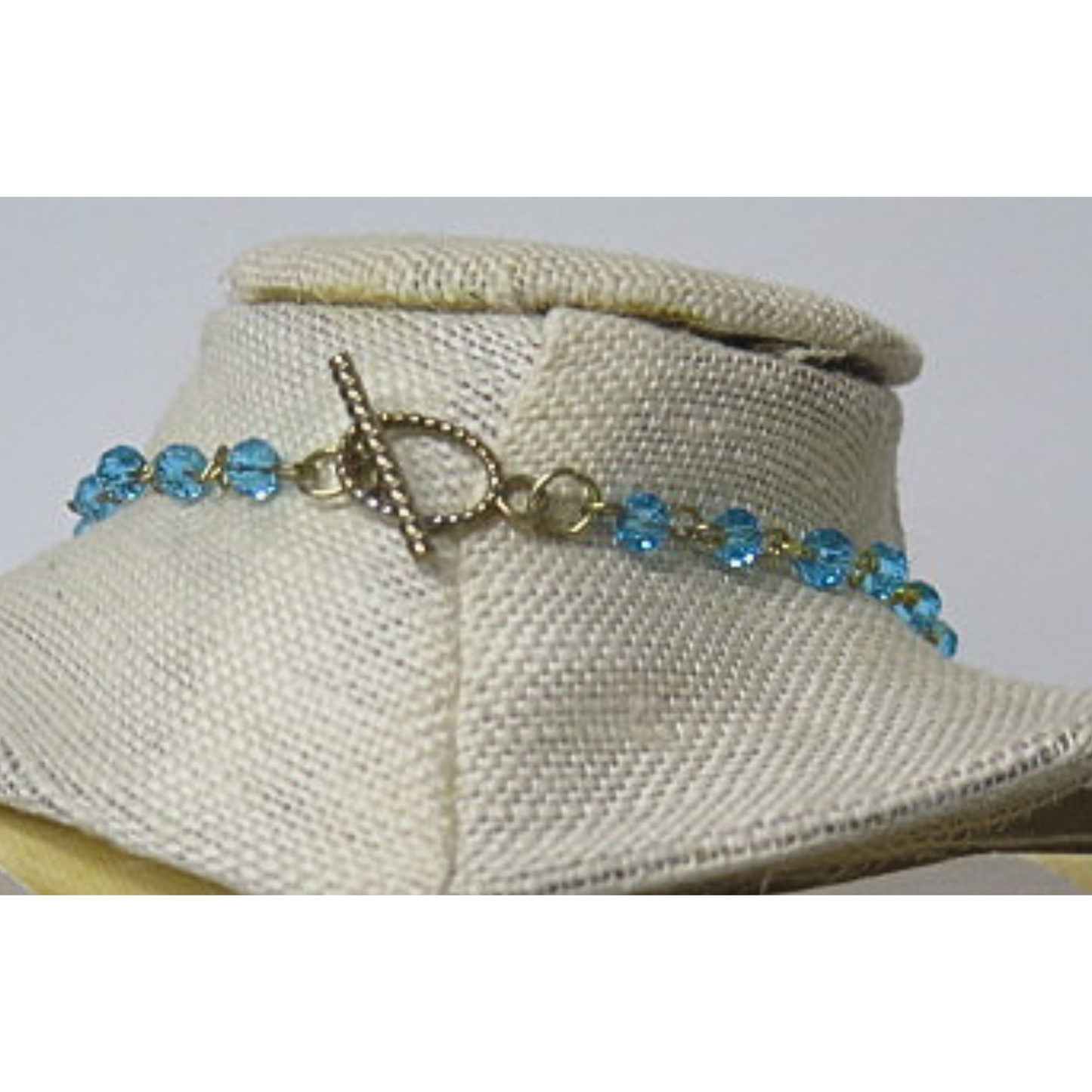 Winged Evil Eye Pendant Necklace | Aqua Blue Crystal Beaded Chain with Bronze Wings and Blue Eye Talisman | 19 Inch Protection Statement Necklace for Women