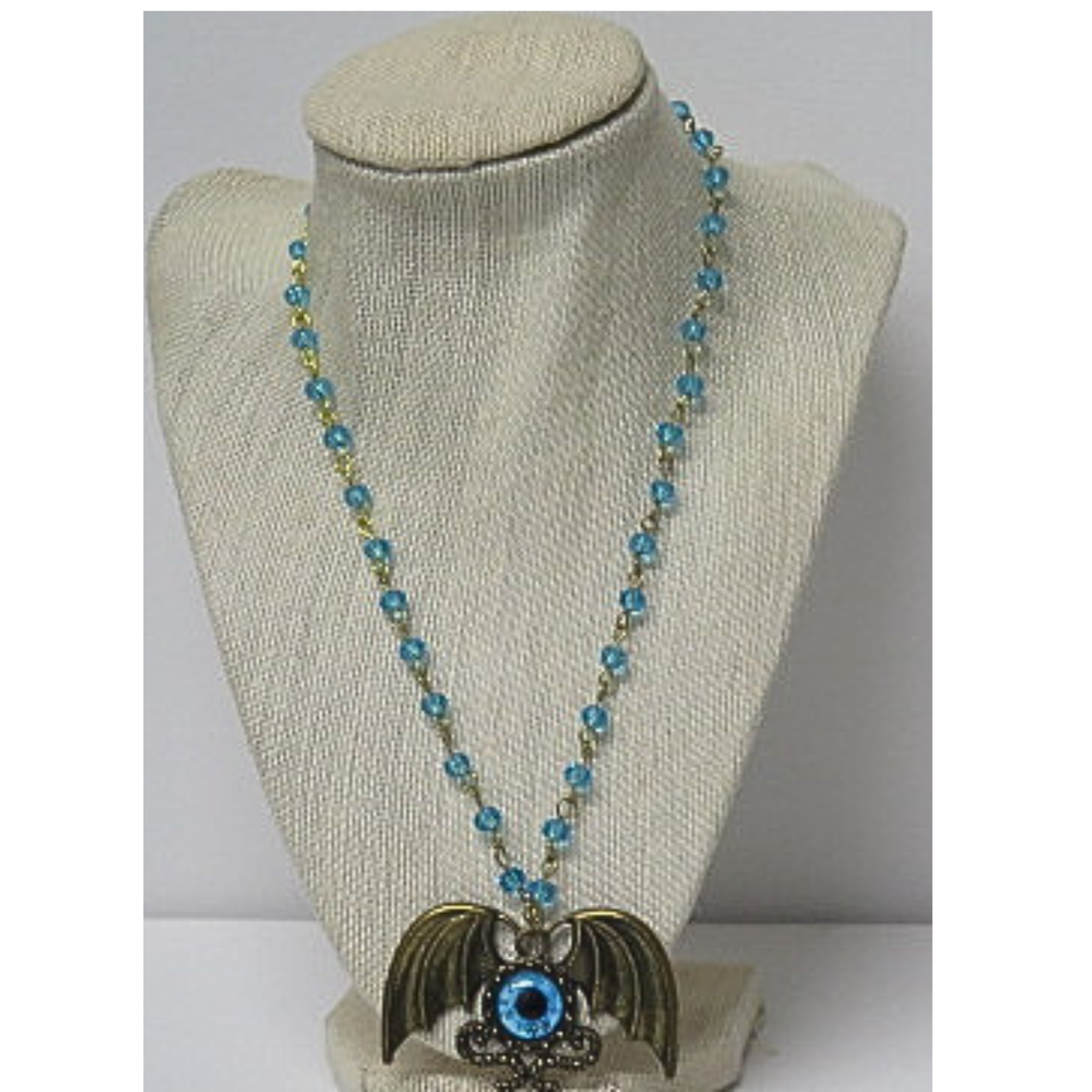 Winged Evil Eye Pendant Necklace | Aqua Blue Crystal Beaded Chain with Bronze Wings and Blue Eye Talisman | 19 Inch Protection Statement Necklace for Women