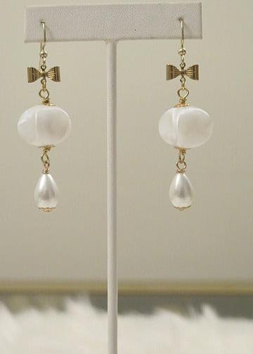 White bead,gold bow Earring