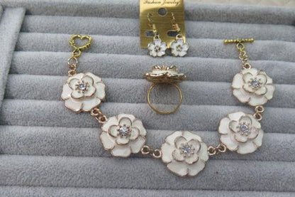 White flower bracelet, ring and earring