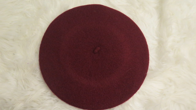 back of dark red beret