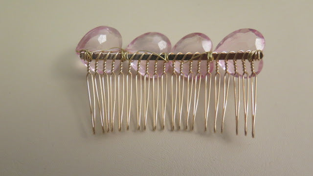 back of pink comb