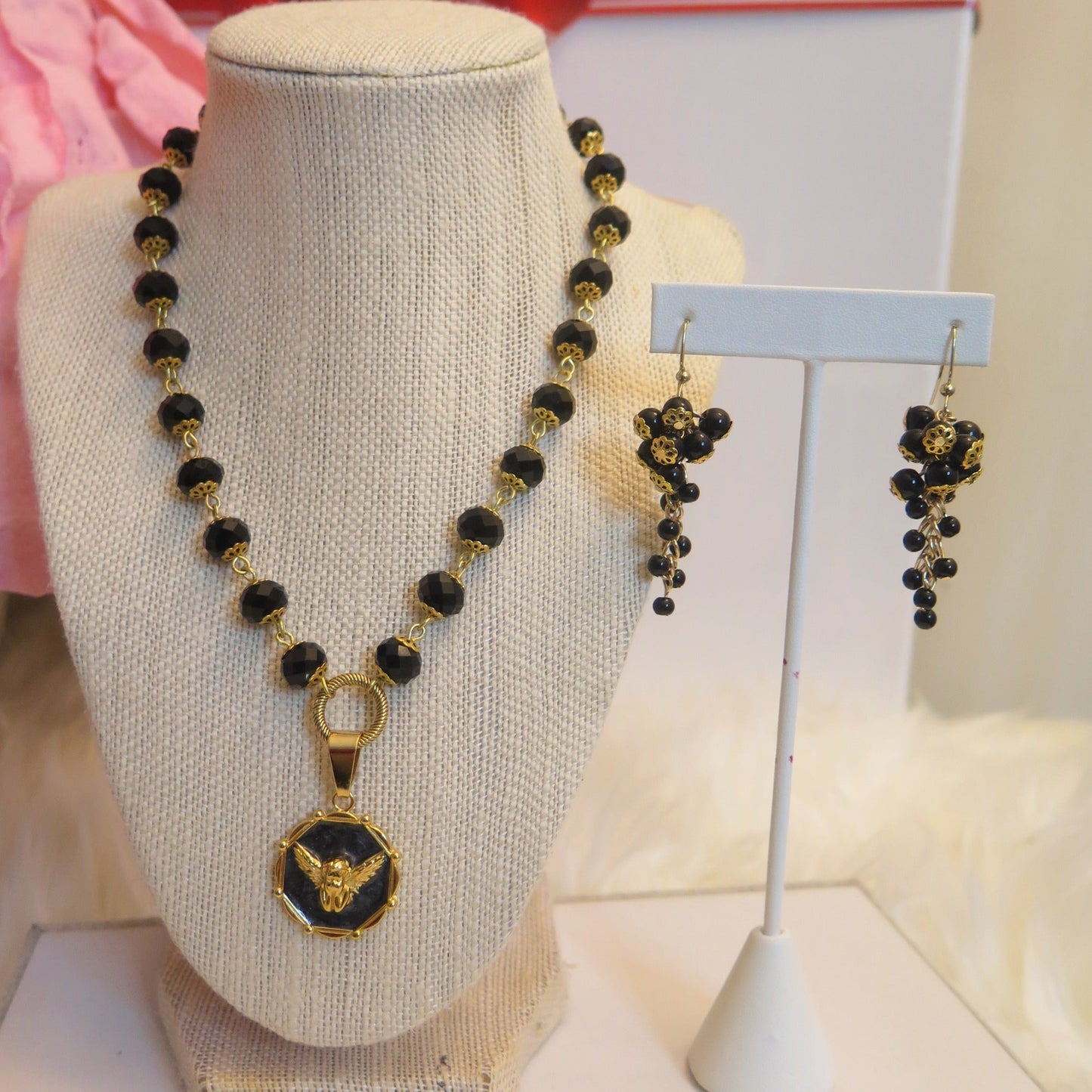 black necklace and cluster earring set