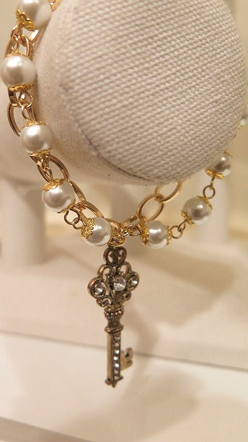 double Pearl  Gold bracelet with key charm