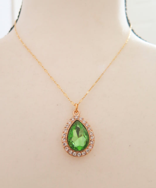 Gold necklace with green pendant