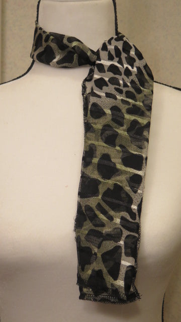 Green grey leopard scarf close up detail