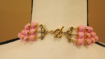 heart-shape of trilayer pinknecklace closure