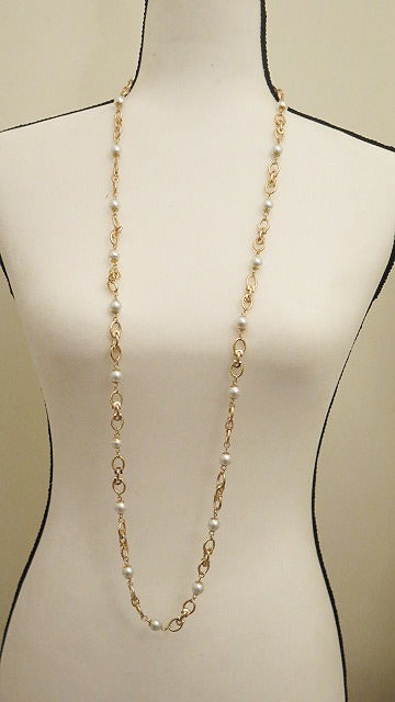 long gold pearl necklace