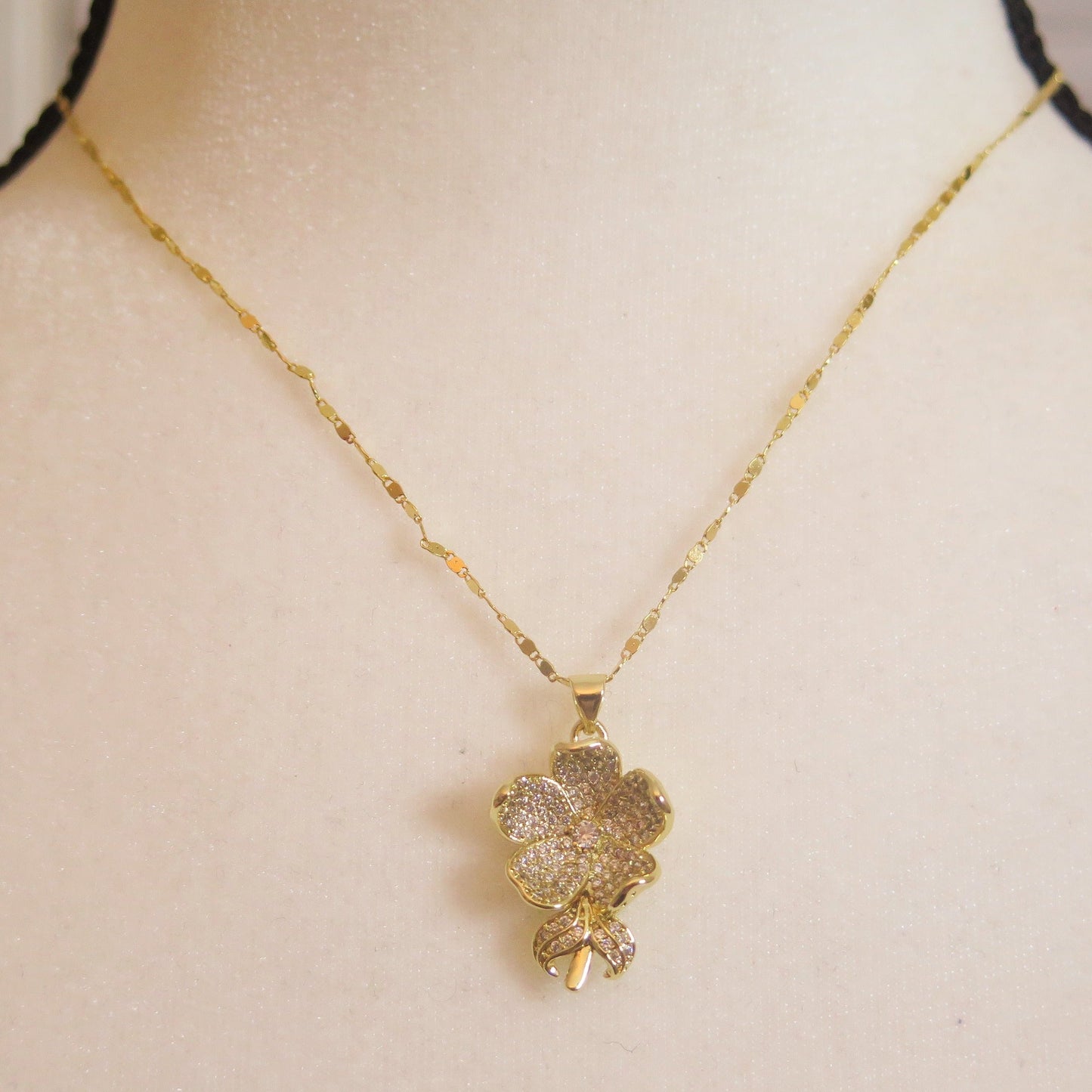 necklace with flower pendant