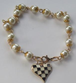 Pearl Bracelet with check charms