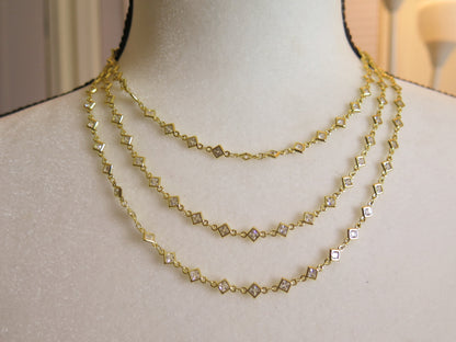 tri gold necklace with sparkling